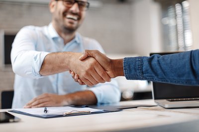 Two people shaking hands